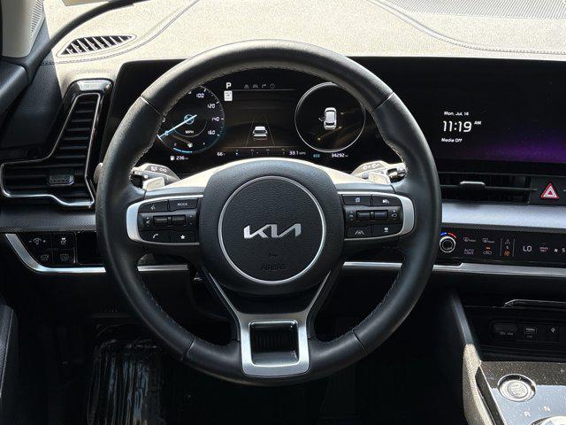 Photo of 2023 Gravity Gray Kia Sportage Hybrid