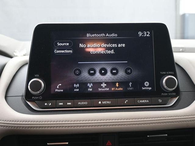 Photo of 2025 Scarlet Ember Tintcoat Nissan Rogue