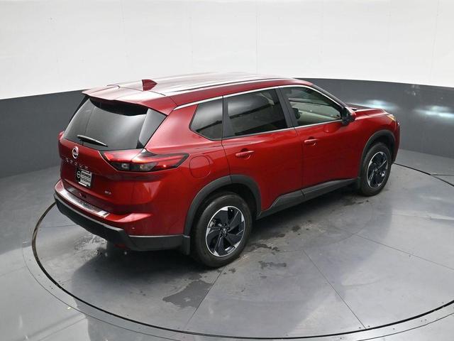 Photo of 2025 Scarlet Ember Tintcoat Nissan Rogue