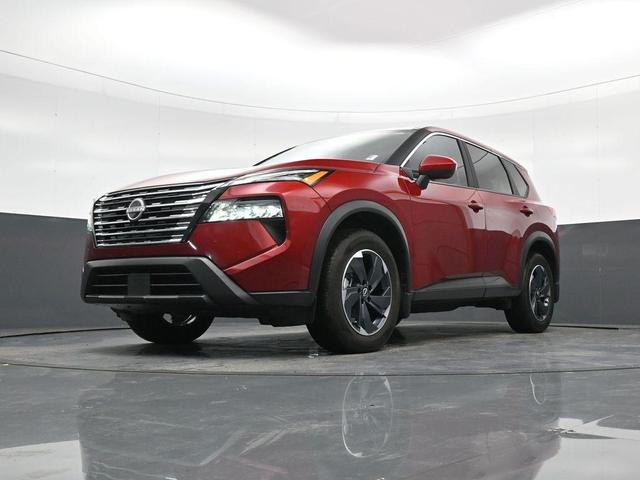 Photo of 2025 Scarlet Ember Tintcoat Nissan Rogue