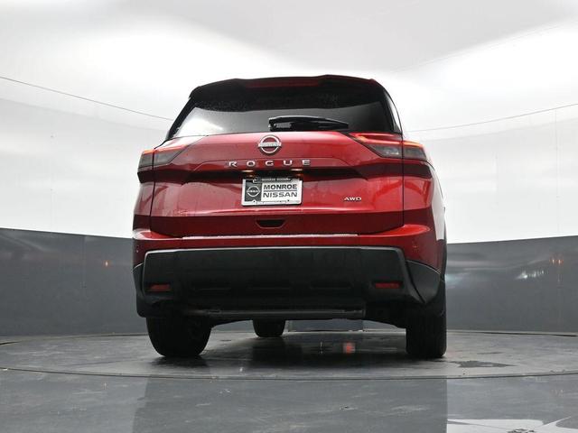 Photo of 2025 Scarlet Ember Tintcoat Nissan Rogue