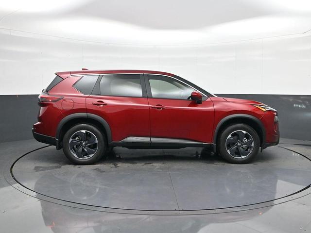 Photo of 2025 Scarlet Ember Tintcoat Nissan Rogue