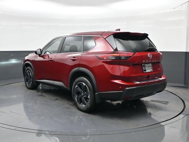 Photo of 2025 Scarlet Ember Tintcoat Nissan Rogue