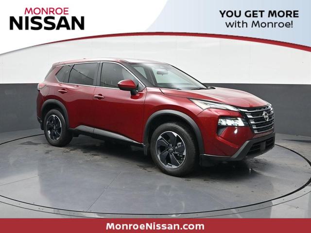 Photo of 2025 Scarlet Ember Tintcoat Nissan Rogue