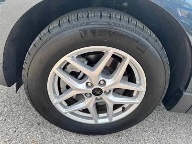 Photo of 2023 Atlas Blue Metallic Ford Edge