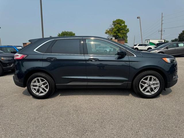 Photo of 2023 Atlas Blue Metallic Ford Edge