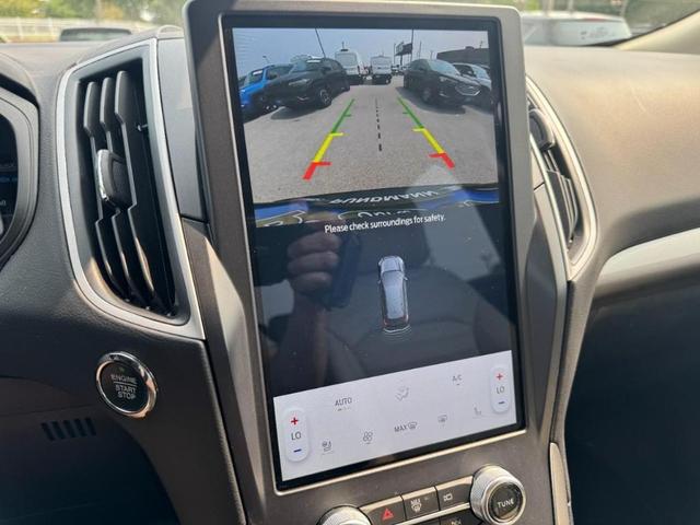Photo of 2023 Atlas Blue Metallic Ford Edge
