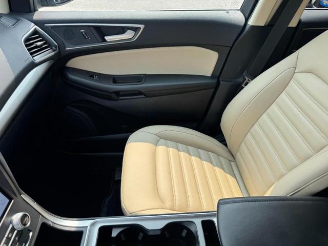 Photo of 2023 Atlas Blue Metallic Ford Edge