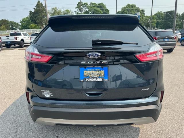 Photo of 2023 Atlas Blue Metallic Ford Edge
