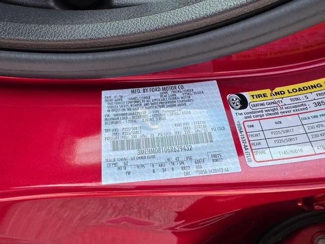 Photo of 2006 Vivid Red Metallic Mercury Milan