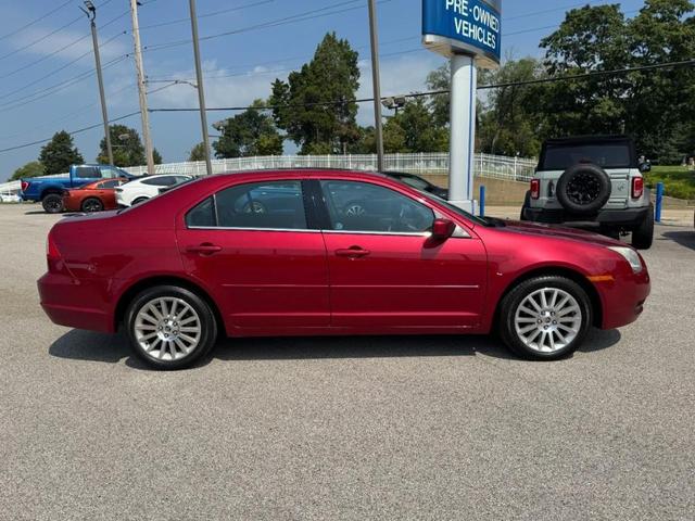 Photo of 2006 Vivid Red Metallic Mercury Milan