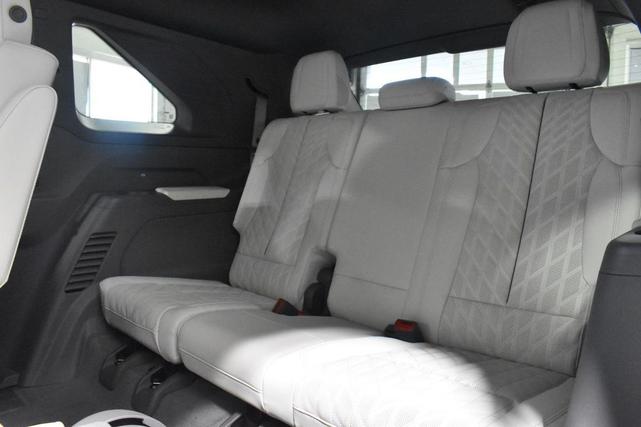 Photo of 2025 BLACK CHERRY TINCTCOAT Cadillac Escalade IQ