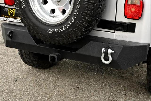 Photo of 2004 Bright Silver Metallic Jeep Wrangler