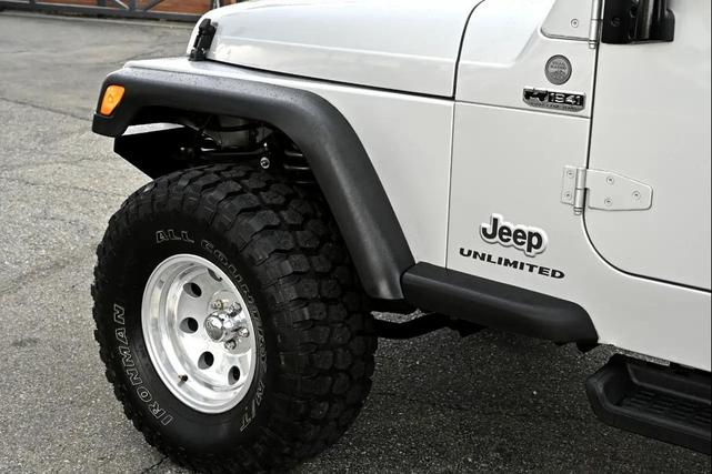 Photo of 2004 Bright Silver Metallic Jeep Wrangler