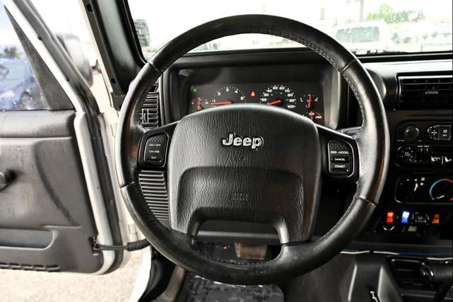 Photo of 2004 Bright Silver Metallic Jeep Wrangler