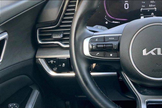 Photo of 2023 Jungle Green Kia Sportage