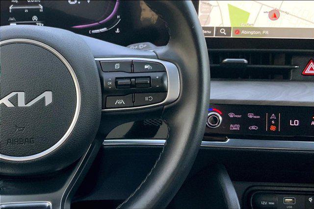 Photo of 2023 Jungle Green Kia Sportage