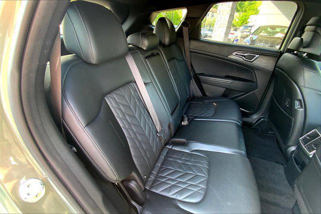 Photo of 2023 Jungle Green Kia Sportage