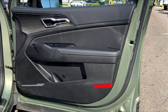 Photo of 2023 Jungle Green Kia Sportage