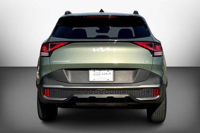 Photo of 2023 Jungle Green Kia Sportage