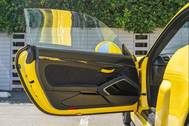 Photo of 2016 Racing Yellow Porsche Cayman