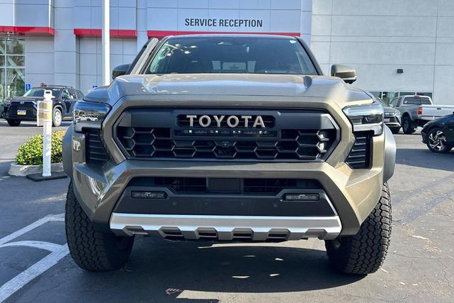 Photo of 2024 Bronze Oxide Toyota Tacoma Hybrid