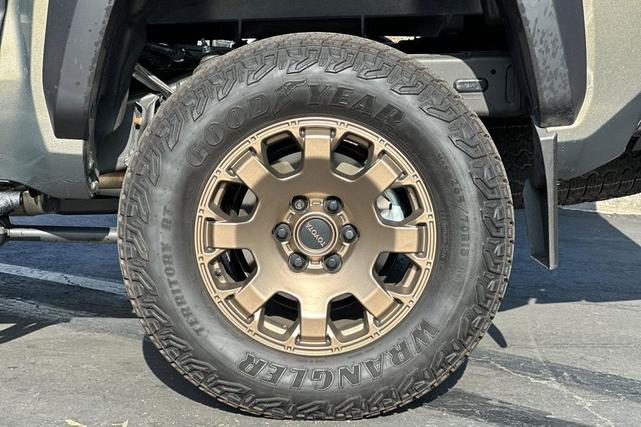 Photo of 2024 Bronze Oxide Toyota Tacoma Hybrid