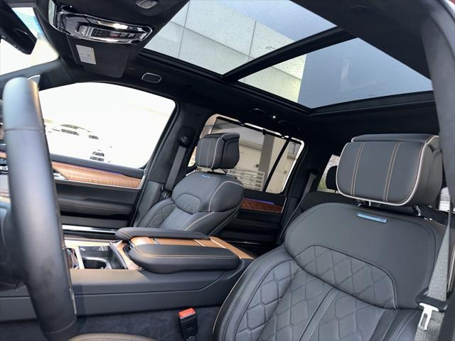 Photo of 2023 Velvet Red Pearlcoat Jeep Grand Wagoneer