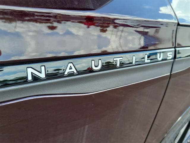 Photo of 2025 Diamond Red Metallic Tinted Clearcoat Lincoln Nautilus