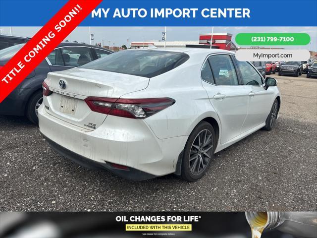 Photo of 2022 Wind Chill Pearl Toyota Camry Hybrid