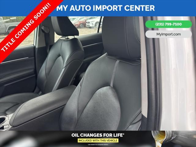 Photo of 2022 Wind Chill Pearl Toyota Camry Hybrid
