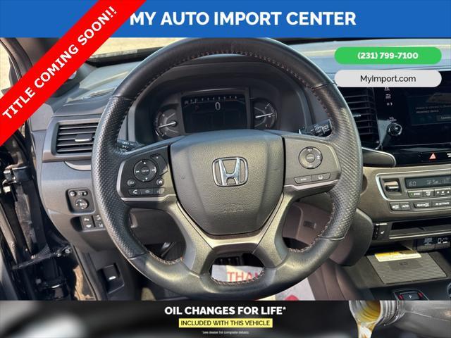 Photo of 2022 Crystal Black Pearl Honda Passport