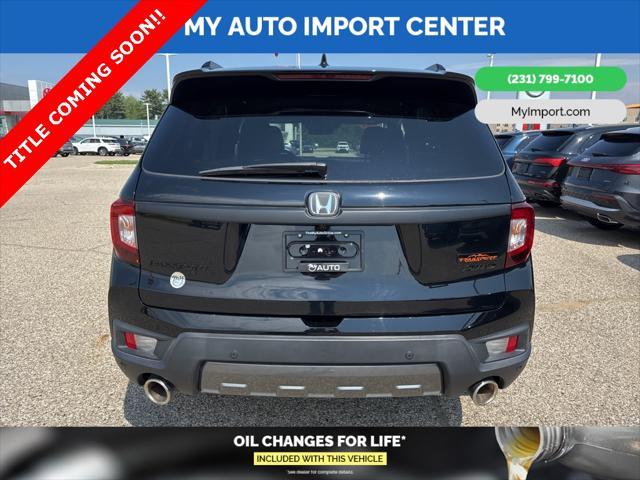 Photo of 2022 Crystal Black Pearl Honda Passport