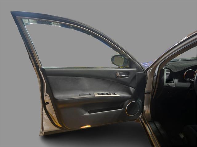 Photo of 2005 Sheer Silver Metallic Nissan Altima
