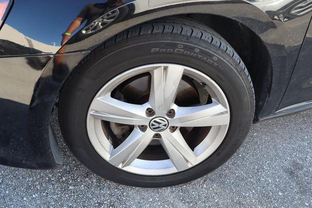 Photo of 2014 Black Volkswagen Passat