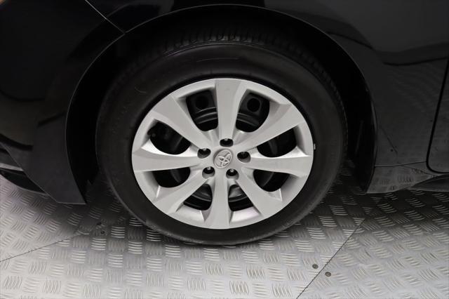 Photo of 2024 Midnight Black Metallic Toyota Corolla