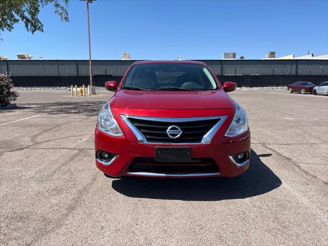 Photo of 2015 Red Brick Nissan Versa