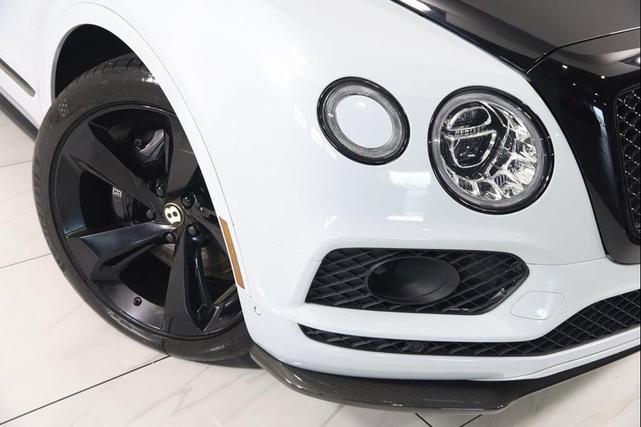 Photo of 2019 White Satin Bentley Bentayga
