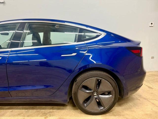 Photo of 2018 Deep Blue Metallic Tesla Model 3