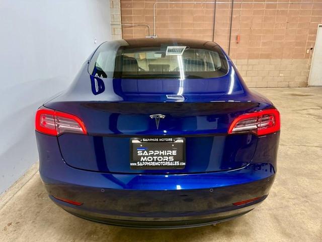 Photo of 2018 Deep Blue Metallic Tesla Model 3