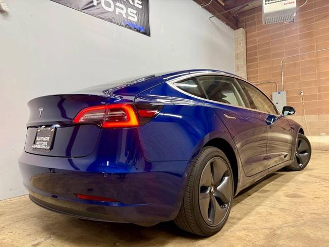 Photo of 2018 Deep Blue Metallic Tesla Model 3