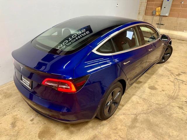 Photo of 2018 Deep Blue Metallic Tesla Model 3