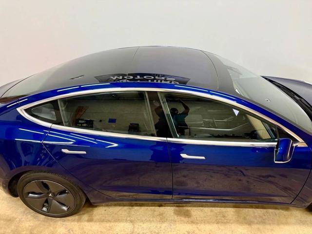 Photo of 2018 Deep Blue Metallic Tesla Model 3