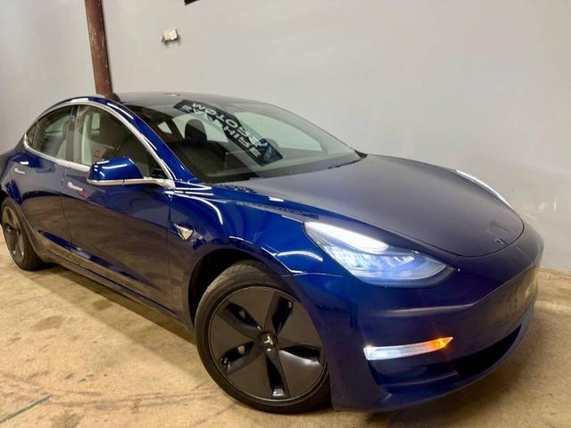 Photo of 2018 Deep Blue Metallic Tesla Model 3