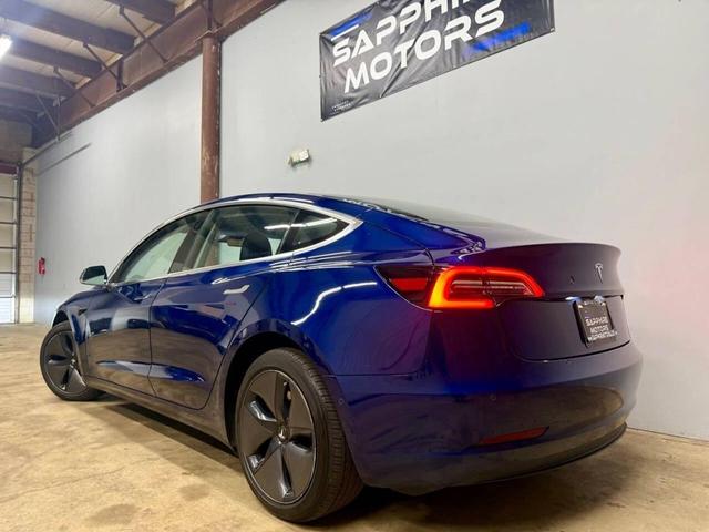 Photo of 2018 Deep Blue Metallic Tesla Model 3