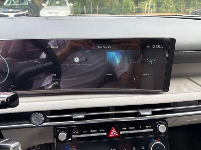 Photo of 2025 White Pearl Hyundai TUCSON Hybrid