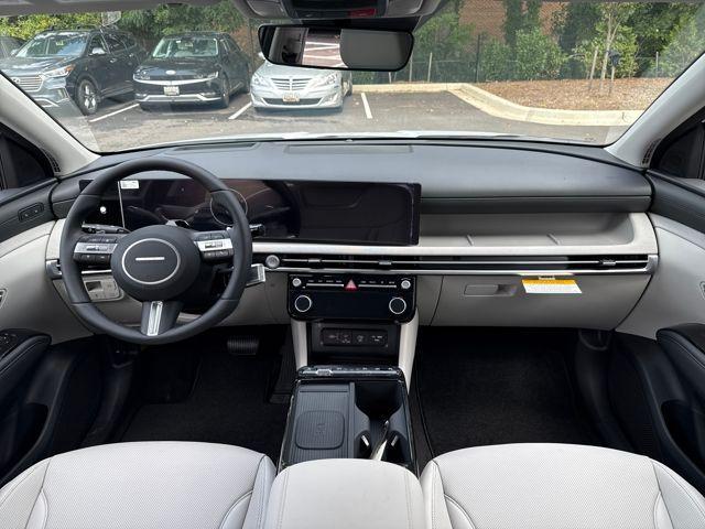 Photo of 2025 White Pearl Hyundai TUCSON Hybrid