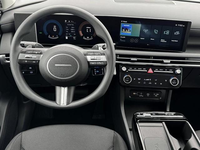 Photo of 2025 White Pearl Hyundai TUCSON Hybrid