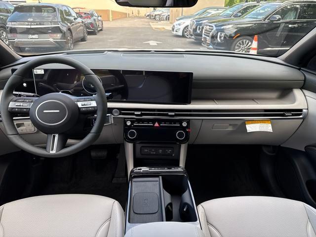 Photo of 2025 White Pearl Hyundai TUCSON Hybrid