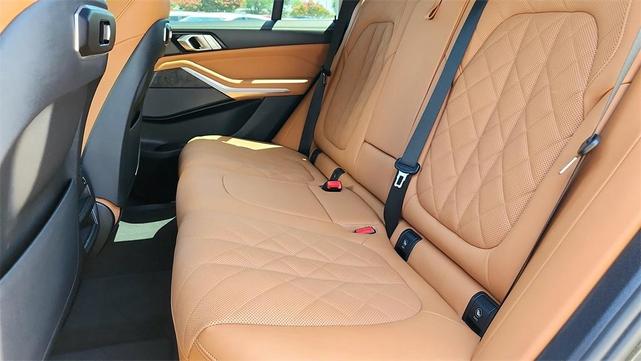 Photo of 2024 Manhattan Green Metallic BMW X5